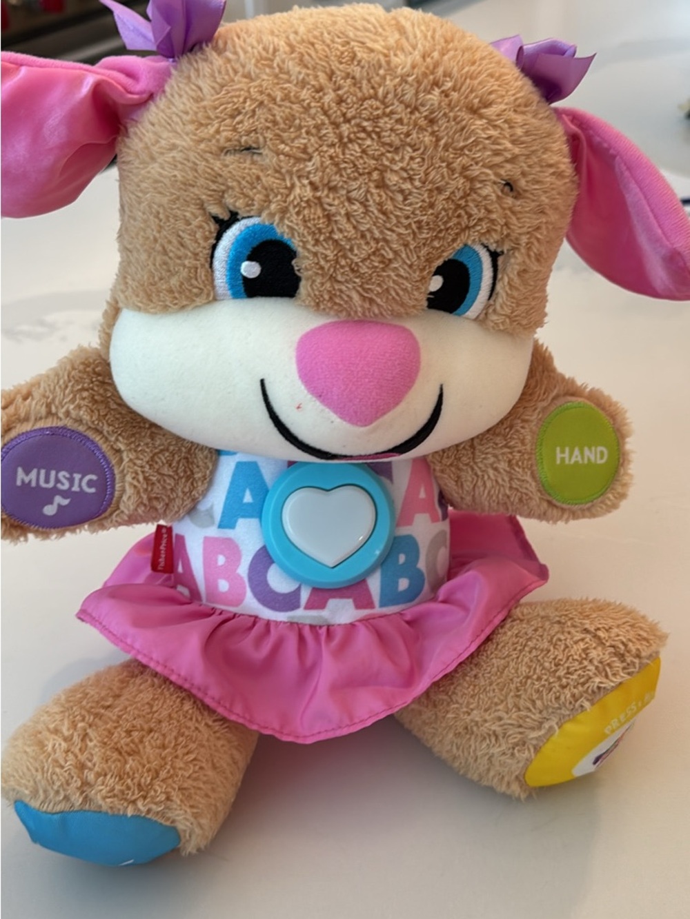 Fisher-Price Tan Plush Puppy with Pink, Blue & Green Accents